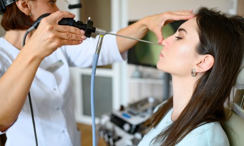 female-laryngologist-patient-chair-exam-nose-examination-clinic-professional-diagnostic-ent-doctor-medical-specialist-woman-hospital