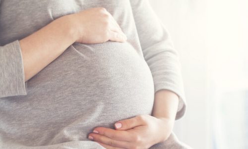 pregnant-woman-touching-her-belly-768x512